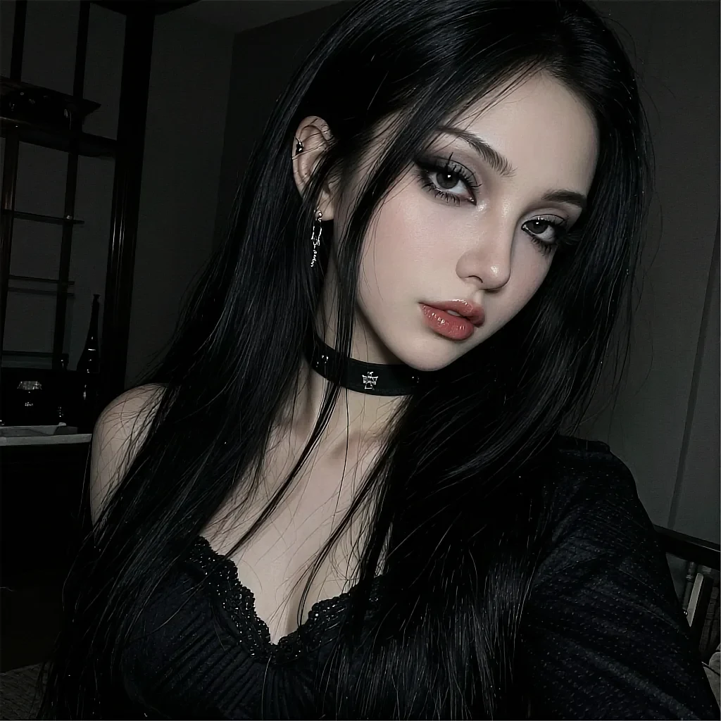 Long straight black-haired woman with a cross-charm choker and black lace-trimmed top in a dark room
